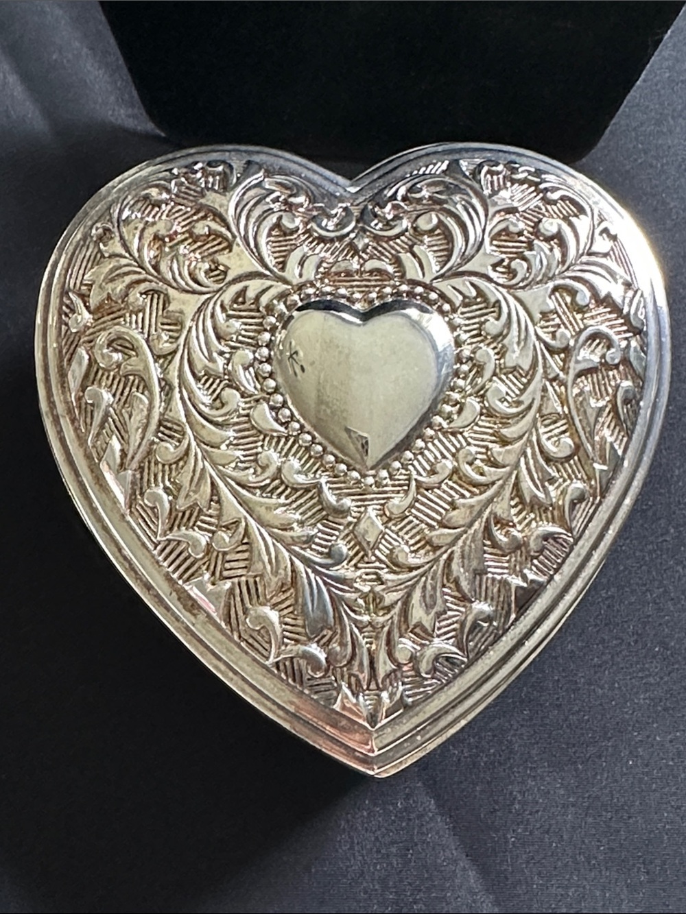 Vintage silvertone EUC heart shaped metal trinket box. Dark blue velvet lining